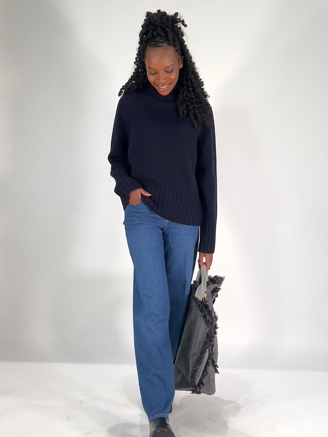 Pull avec détails torsadés