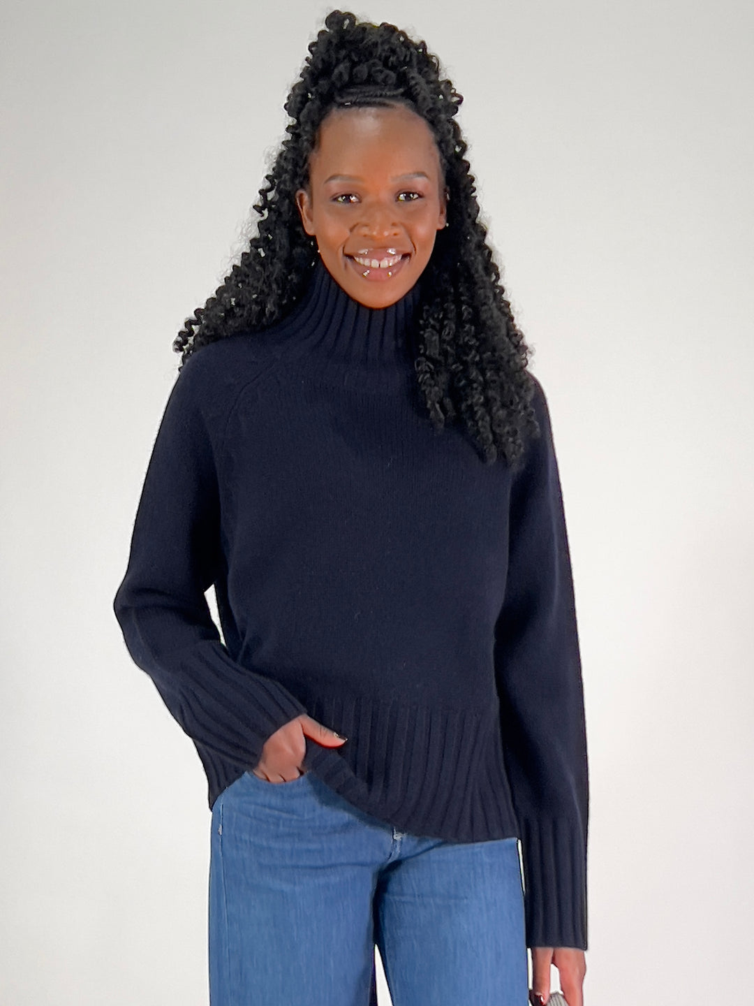 Pull avec détails torsadés