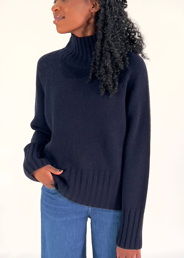Pull avec détails torsadés