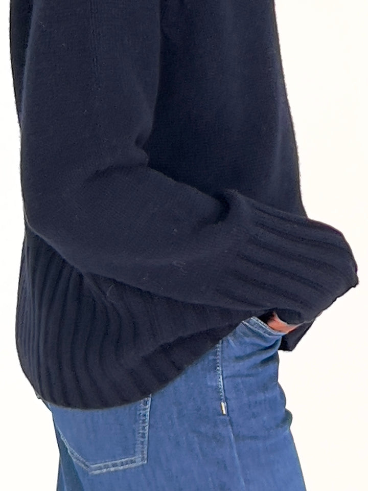 Pull avec détails torsadés