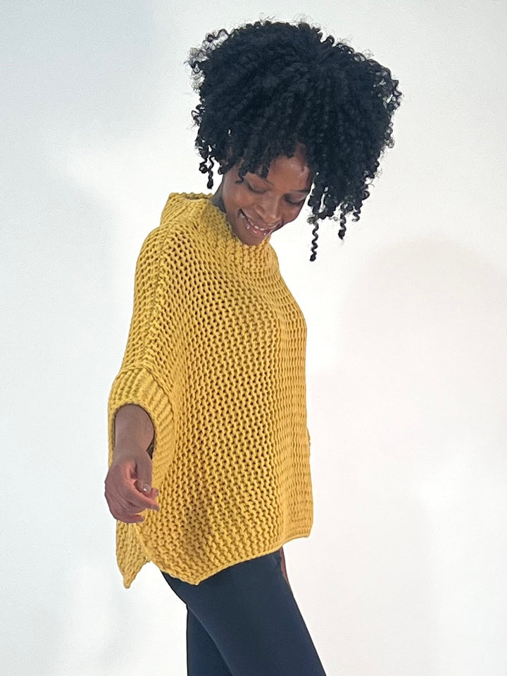 Poncho-Pulli im Linksstrick