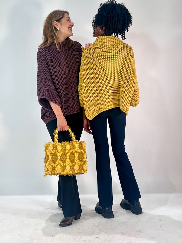 Poncho-Pulli im Linksstrick