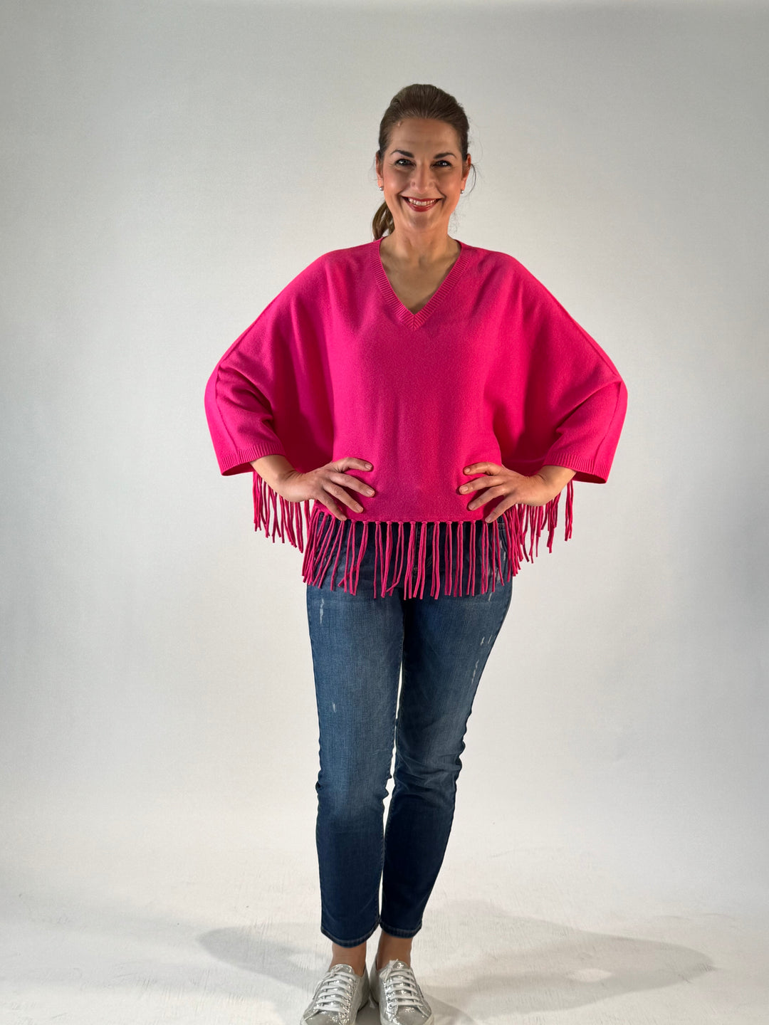 Poncho mit Arm und Fransen