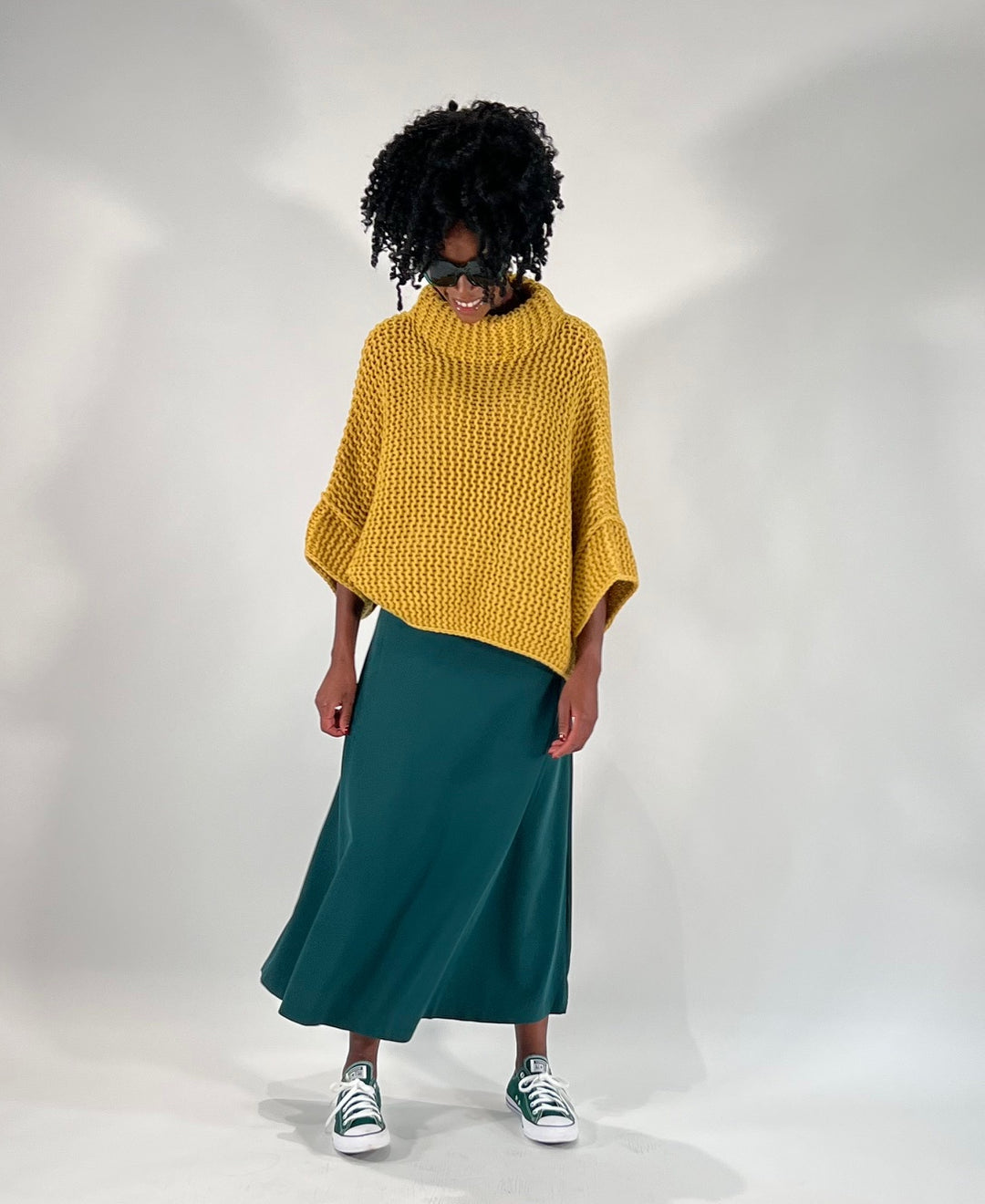 Poncho-Pulli im Linksstrick