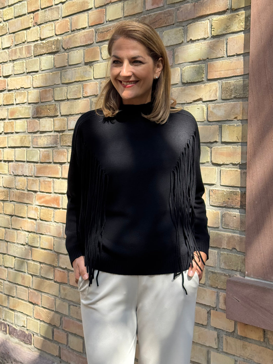 Stehkragen-Pulli mit Fransendetails